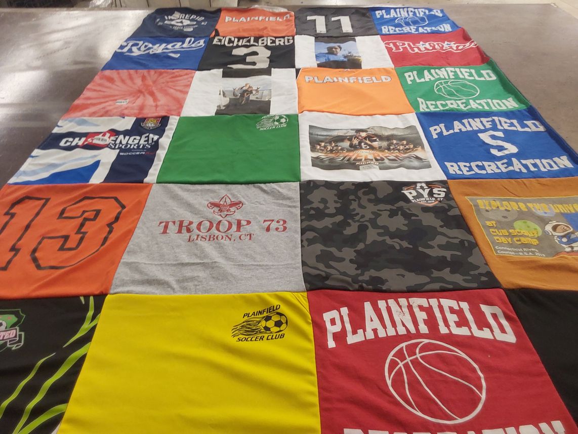 T-shirt quilt with sports, recreation themes by Meghan from CT