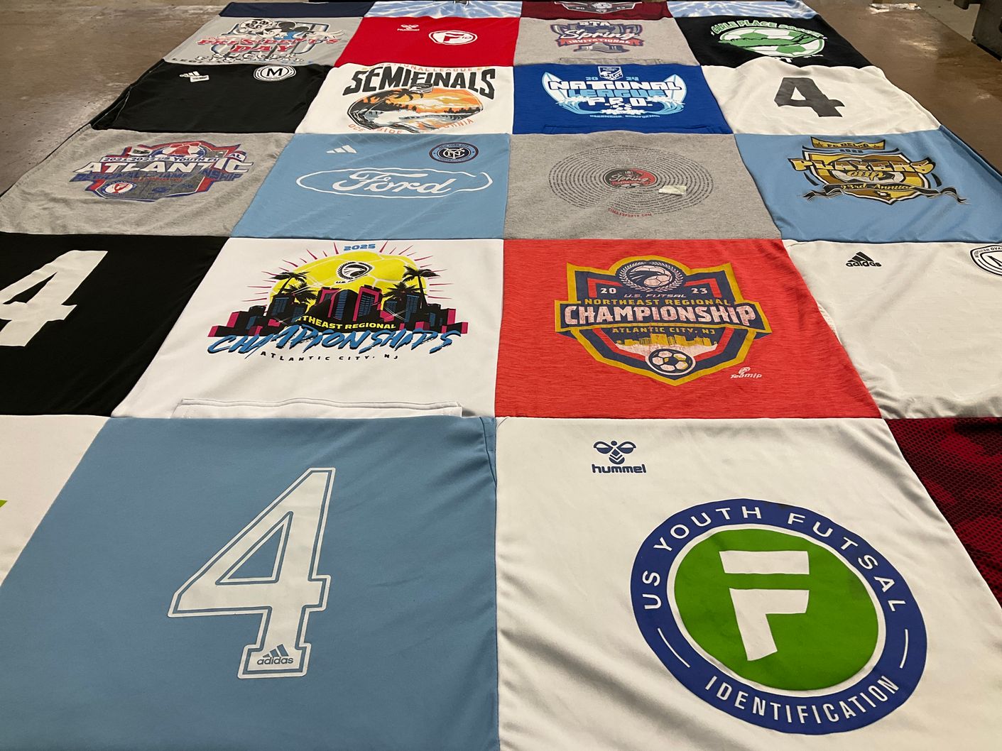 T-shirt quilt with soccer, futsal themes by Jennifer from NY