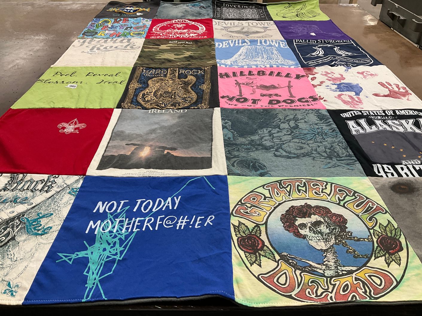 T-shirt quilt with music, travel themes by Cindy from AK