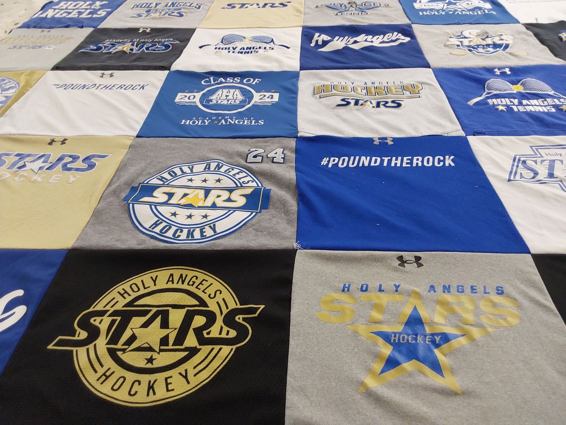 T-shirt quilt featuring holy angels stars hockey by Heather from MN