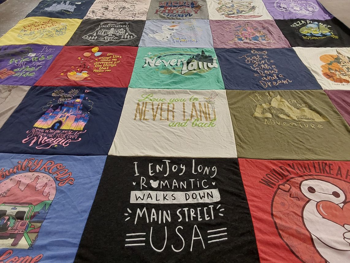 T-shirt quilt with disney, travel themes by Laura from VA