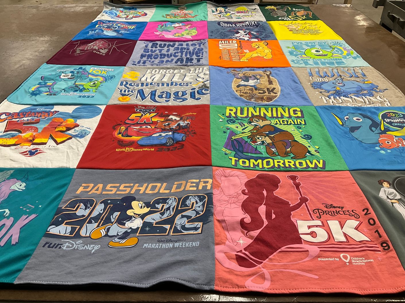 T-shirt quilt with disney, running themes by Laura from FL