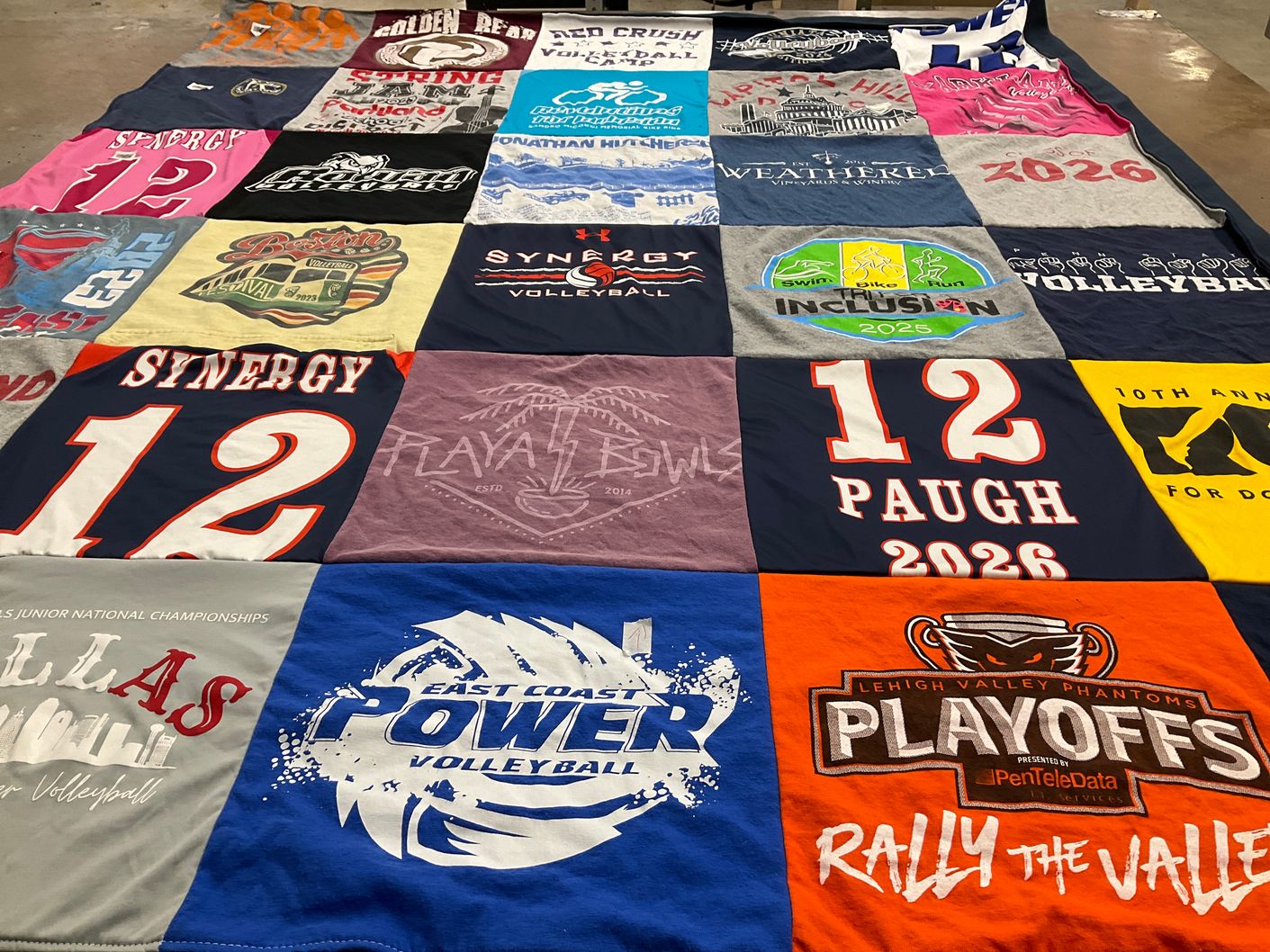 T-shirt quilt with volleyball, swimming themes by Jennifer from PA