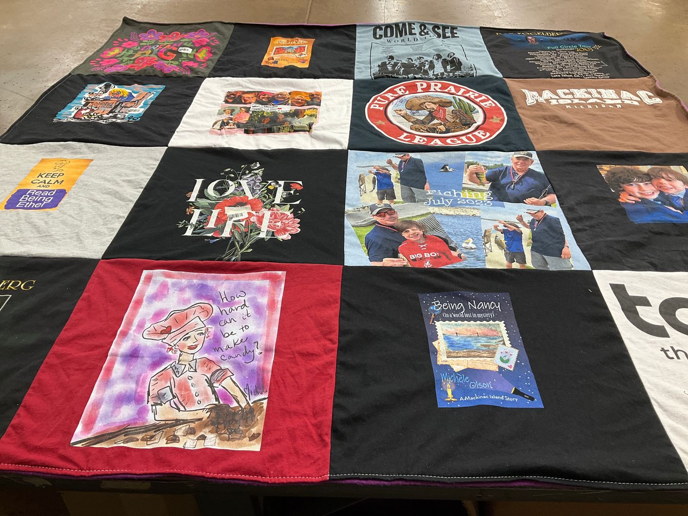T-shirt quilt with fishing, candy making themes by Michele from WI