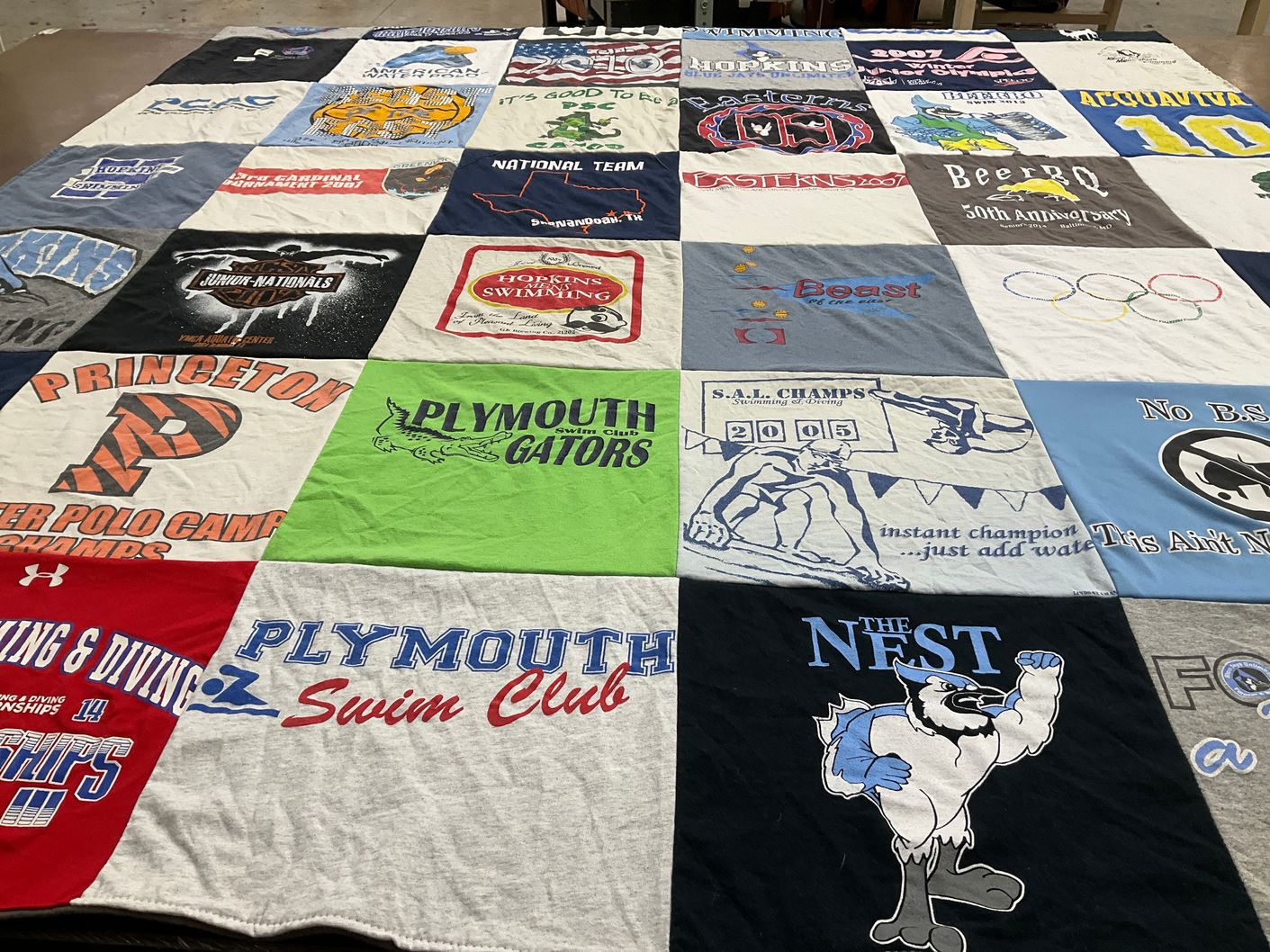 T-shirt quilt featuring plymouth swim club by Joseph from PA