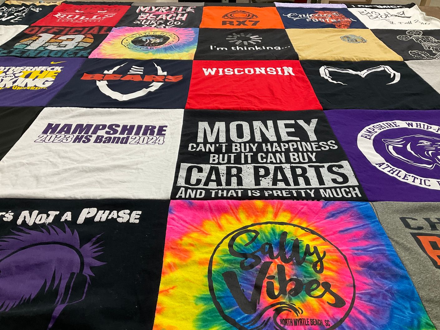 T-shirt quilt featuring hampshire whip-purs by Victoria from IL