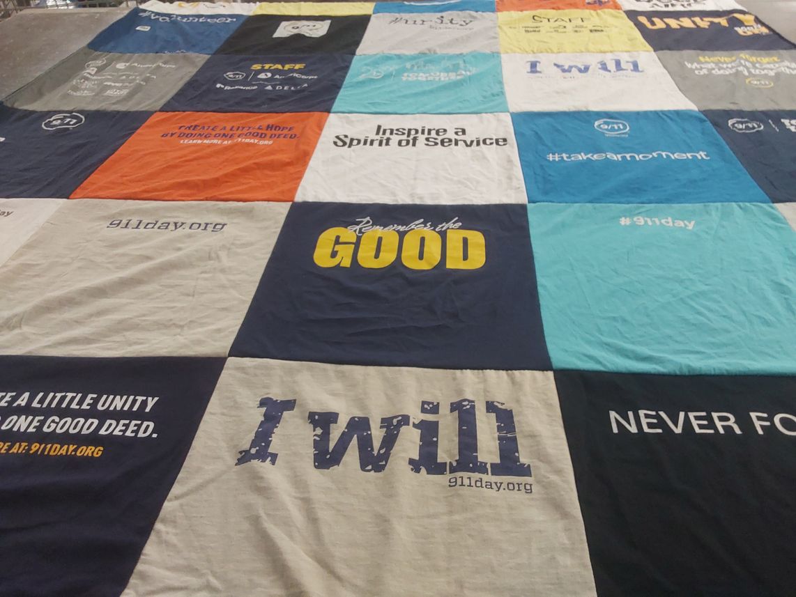 T-shirt quilt with community service, volunteering themes by ellen from CT