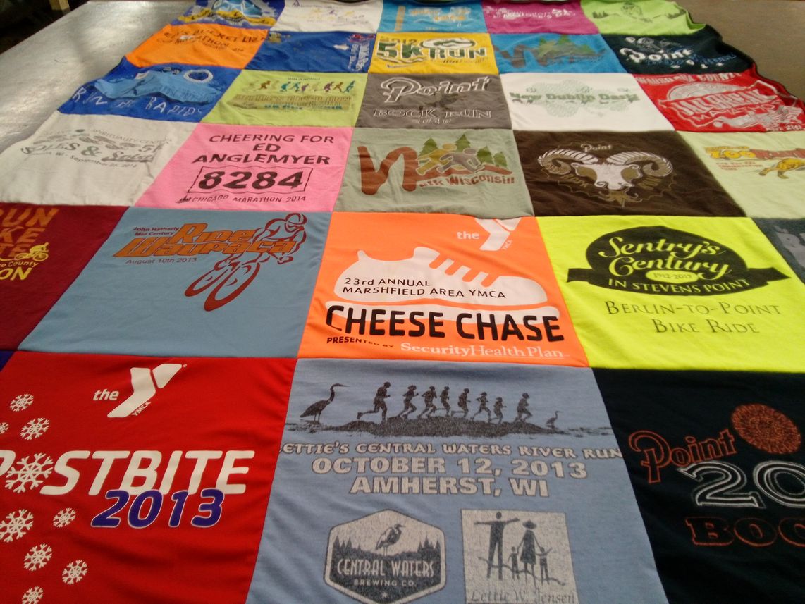 T-shirt quilt with running, biking themes by Kimberly from WI