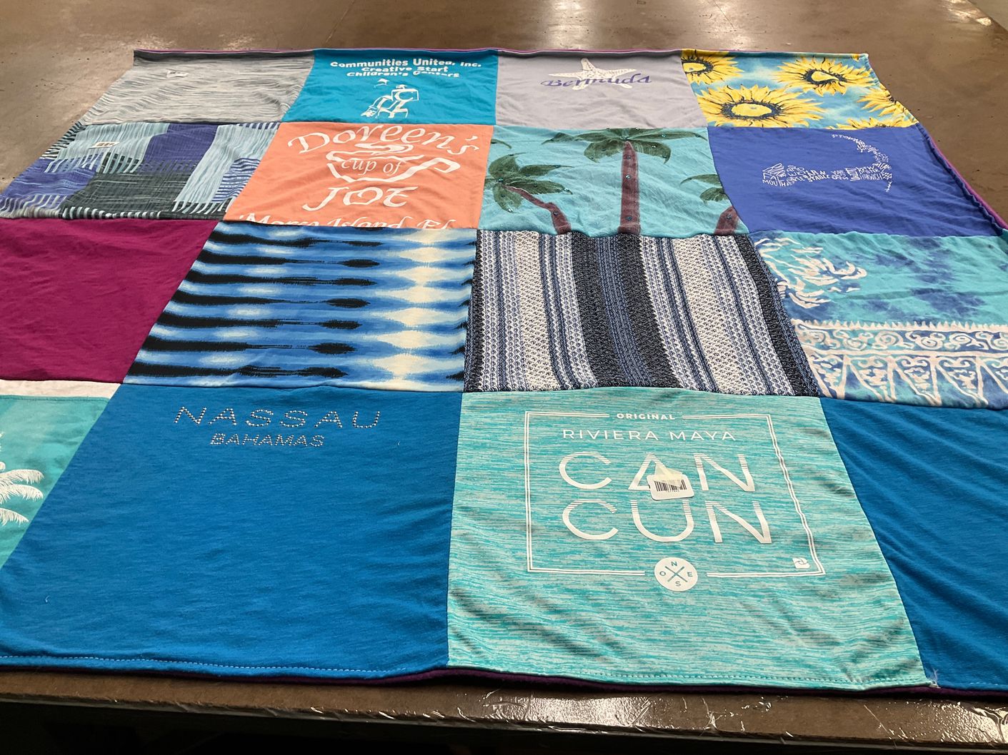 T-shirt quilt with travel, beaches themes by Christopher from MA