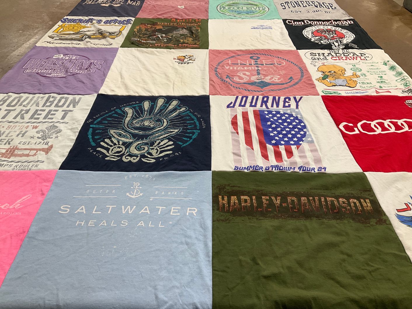T-shirt quilt with travel, music themes by Cathleen from VA