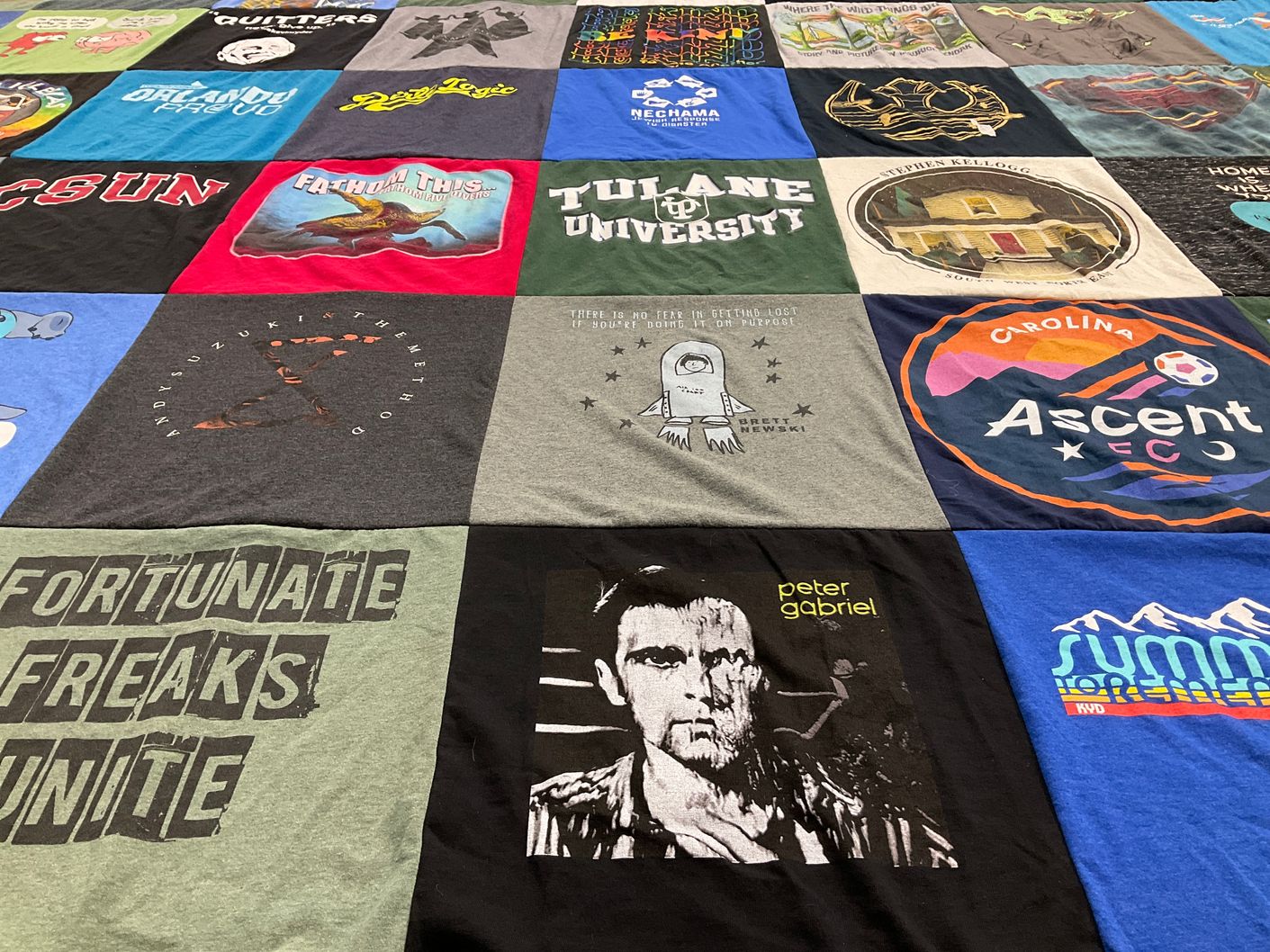 T-shirt quilt featuring ascent fc by Crystal from NC