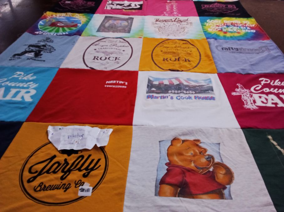 T-shirt quilt with fairs, brewing themes by Mary from KY