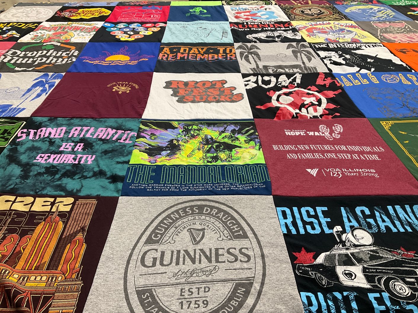 T-shirt quilt with music, pop culture themes by VINCENT from IL