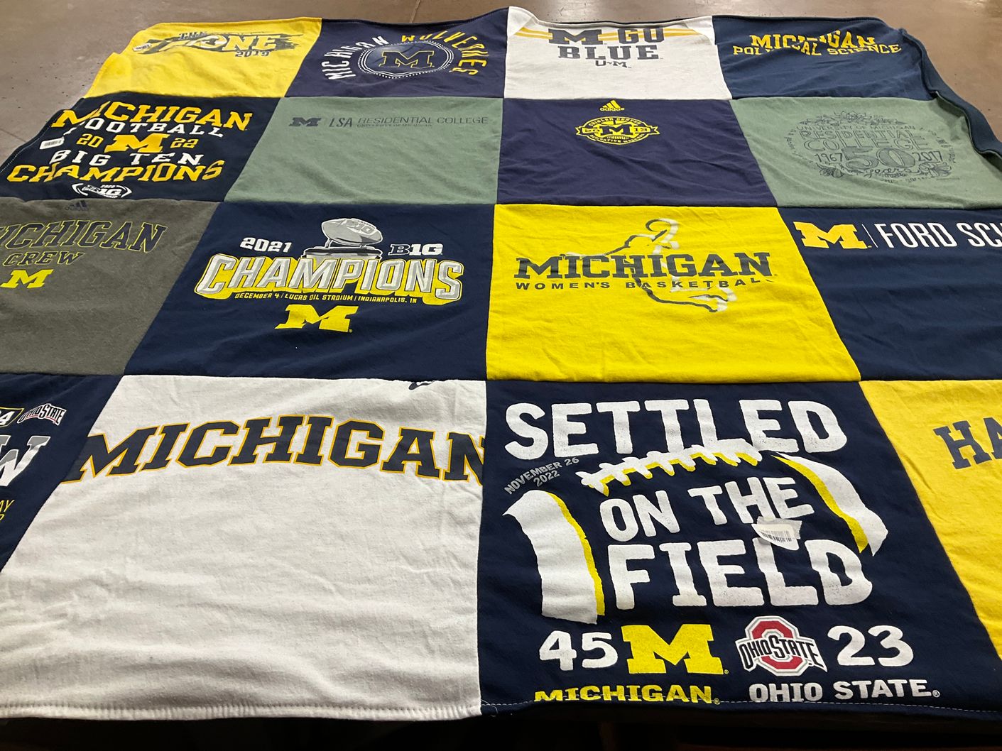 T-shirt quilt featuring university of michigan football, university of michigan basketball by Annmarie from MA