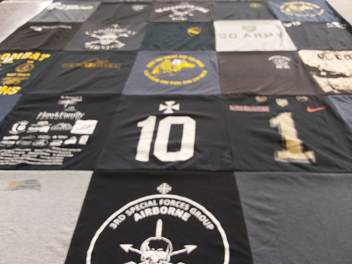 T-shirt quilt with military, veterans themes by Christie from PA