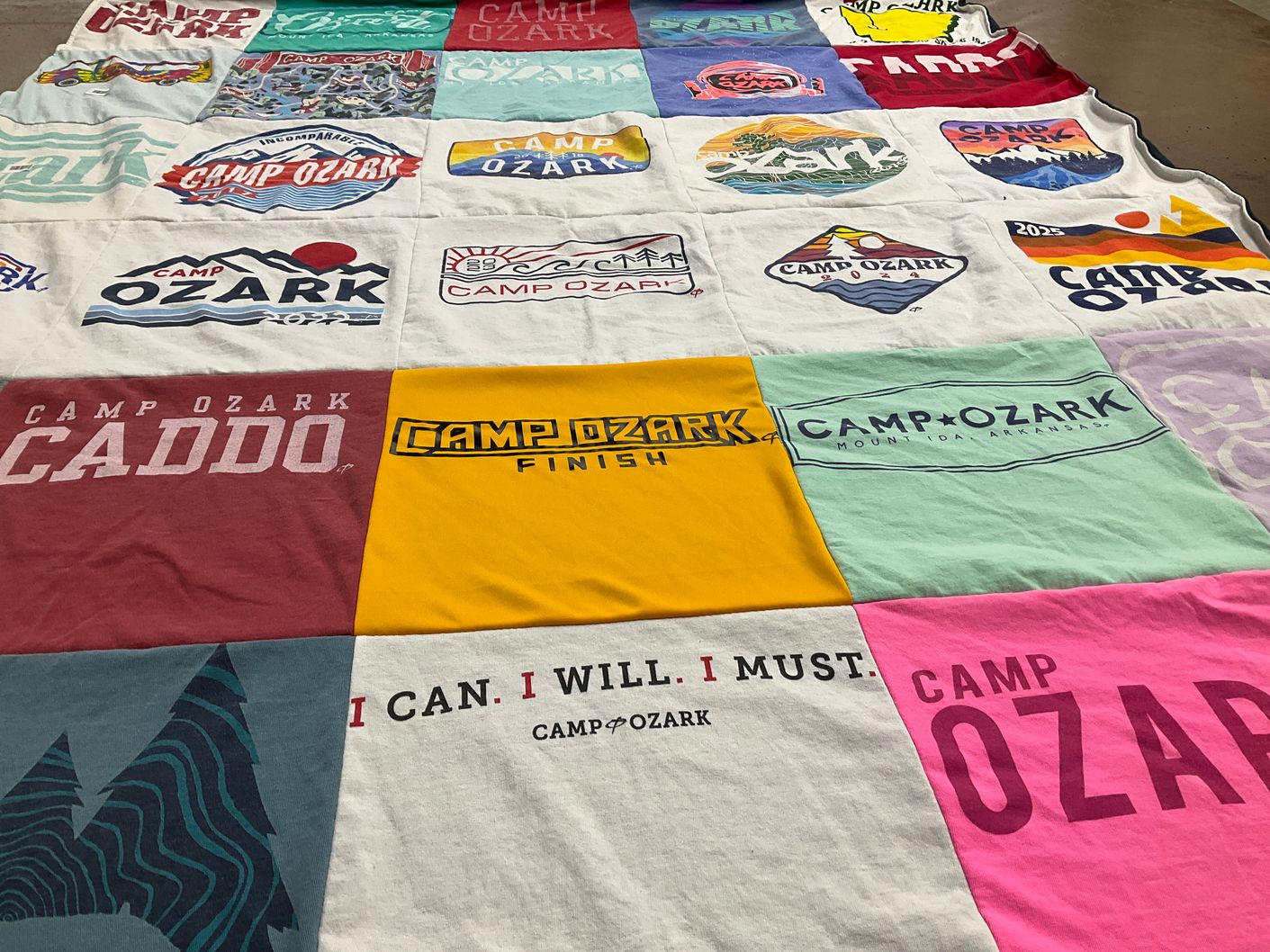 T-shirt quilt with camping, outdoor activities themes by Leslie from TX