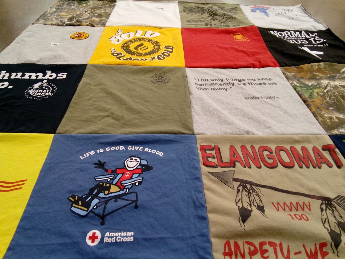 T-shirt quilt with fitness, blood donation themes by Gail from MO