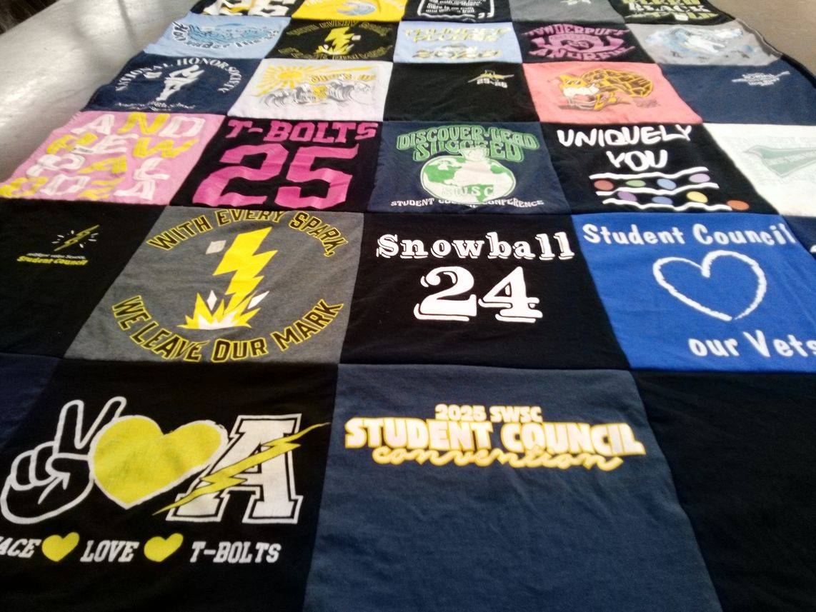 T-shirt quilt with student council, leadership themes by Michelle from IL