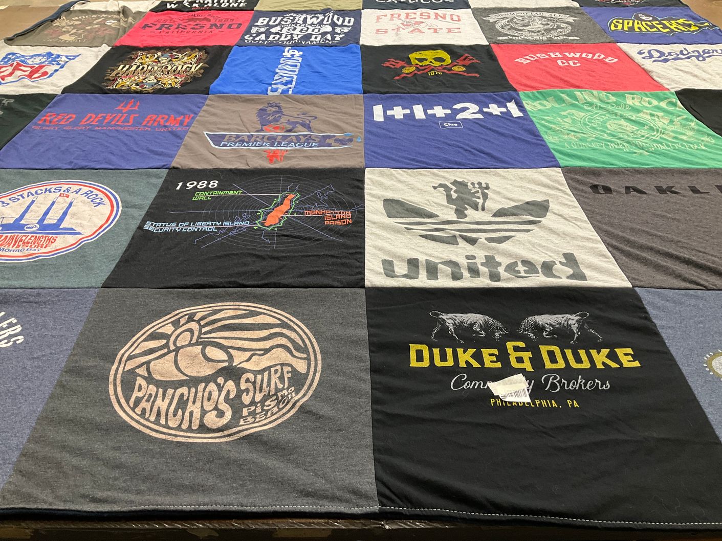 T-shirt quilt with sports themes by Julie from WA