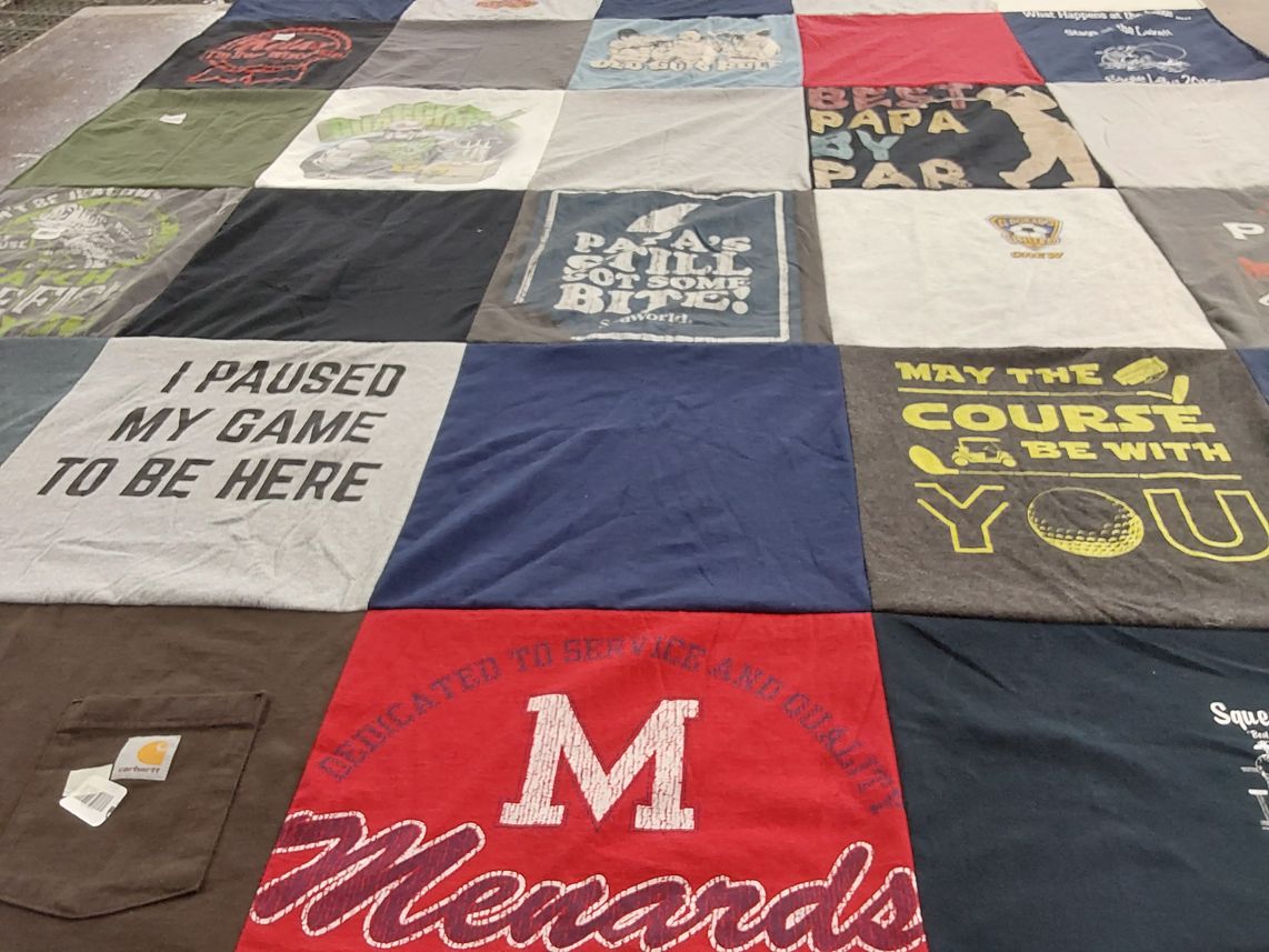 T-shirt quilt with gaming, golfing themes by Kimberly from CA