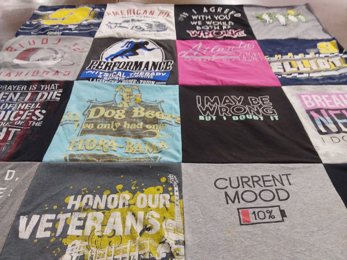 T-shirt quilt with veterans, sports themes by Dennis from WI