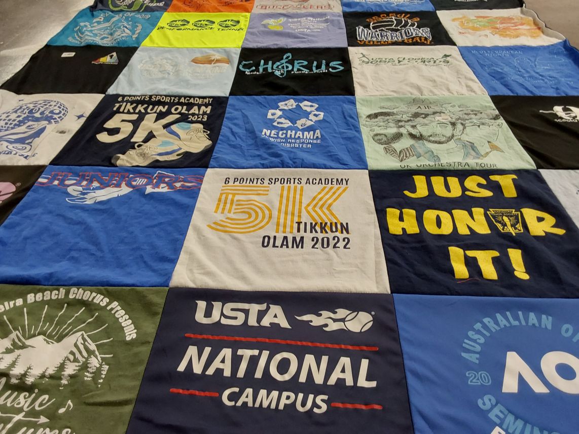 T-shirt quilt with sports, music themes by Home from FL