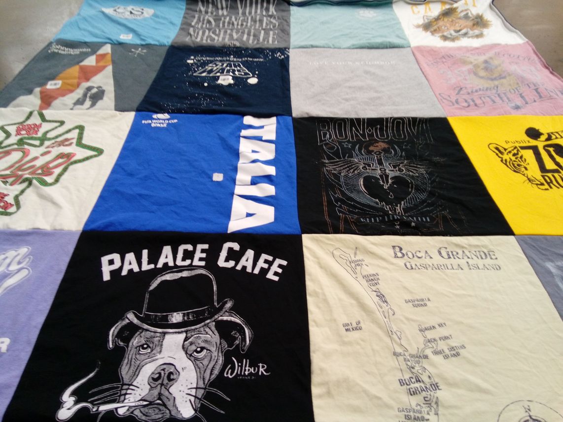 T-shirt quilt with travel, music themes by Giuliana from TN