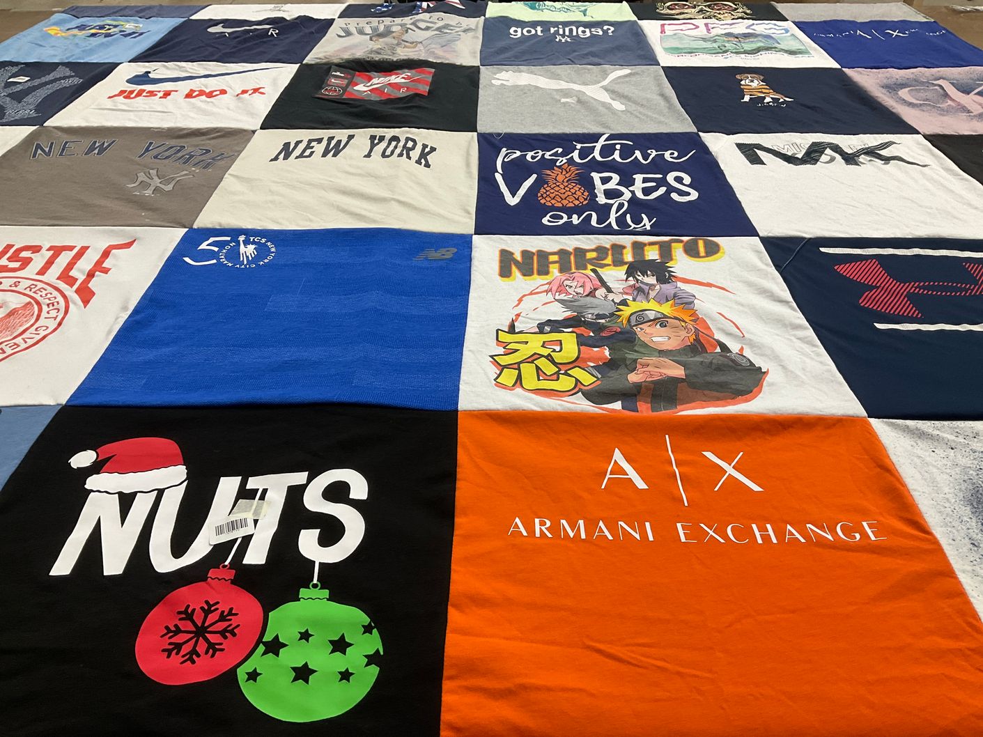 T-shirt quilt with anime, sports themes by Alexandra from FL