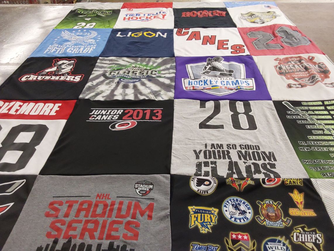 T-shirt quilt featuring carolina hurricanes, pittsburgh penguins by Lucille from NC