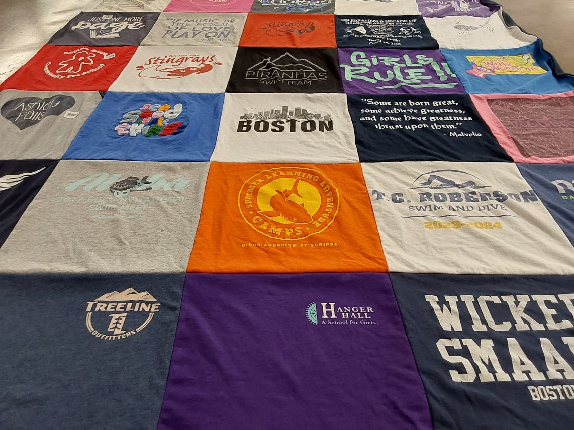 T-shirt quilt featuring piranhas swim team, stingrays swim team by Amy from NC