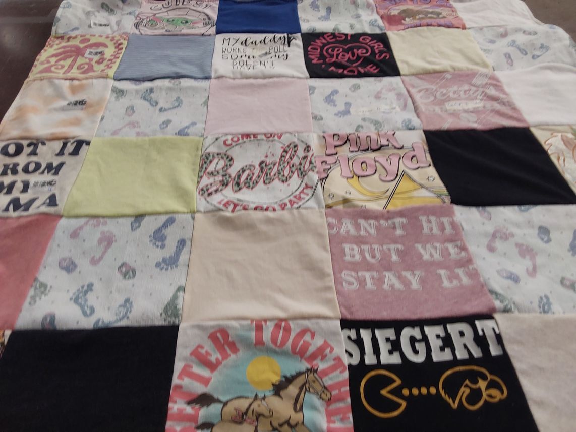 T-shirt quilt with music, pop culture themes by Sarah from IA