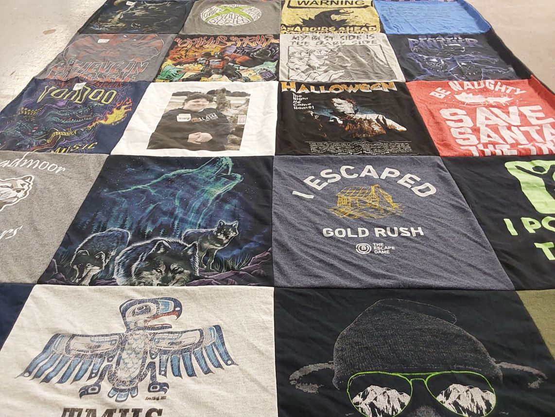 T-shirt quilt with music, games themes by Stacey from AK