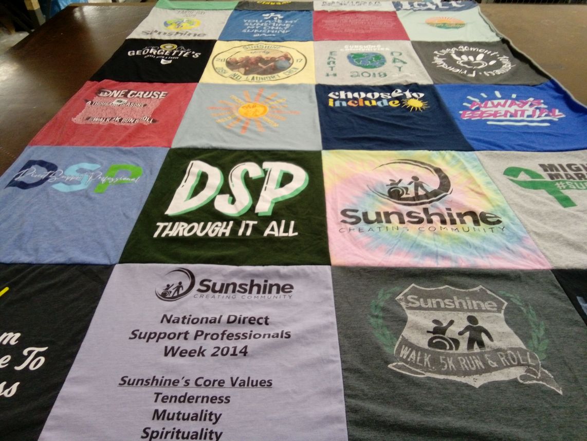T-shirt quilt with community support, direct support services themes by Jacky from OH