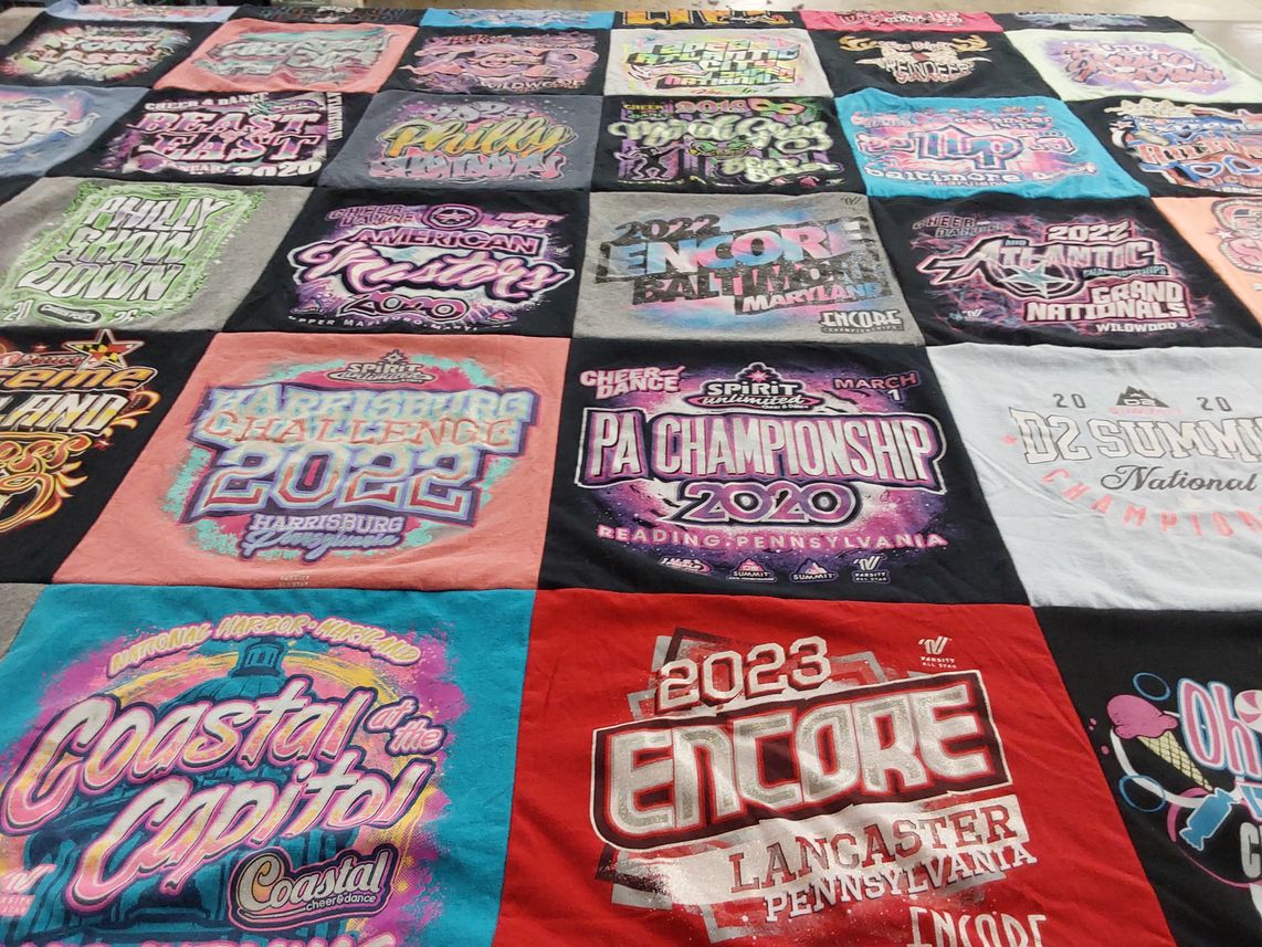 T-shirt quilt with cheerleading, dance competitions themes by Ella from PA