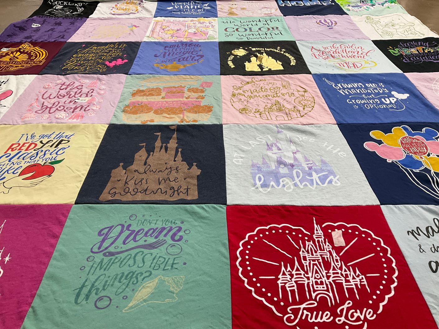 T-shirt quilt with disney, fantasy themes by Laura from FL