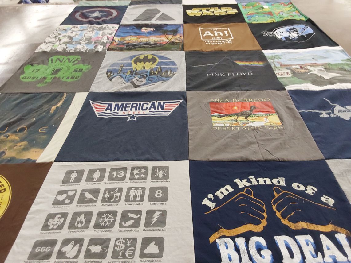 T-shirt quilt with movies, music themes by MacKenzie from OR