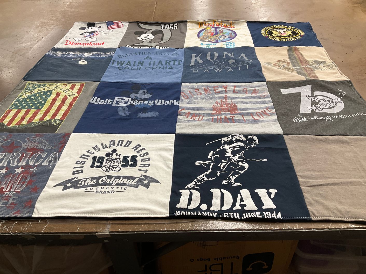 T-shirt quilt with disney, travel themes by Joanne from CA