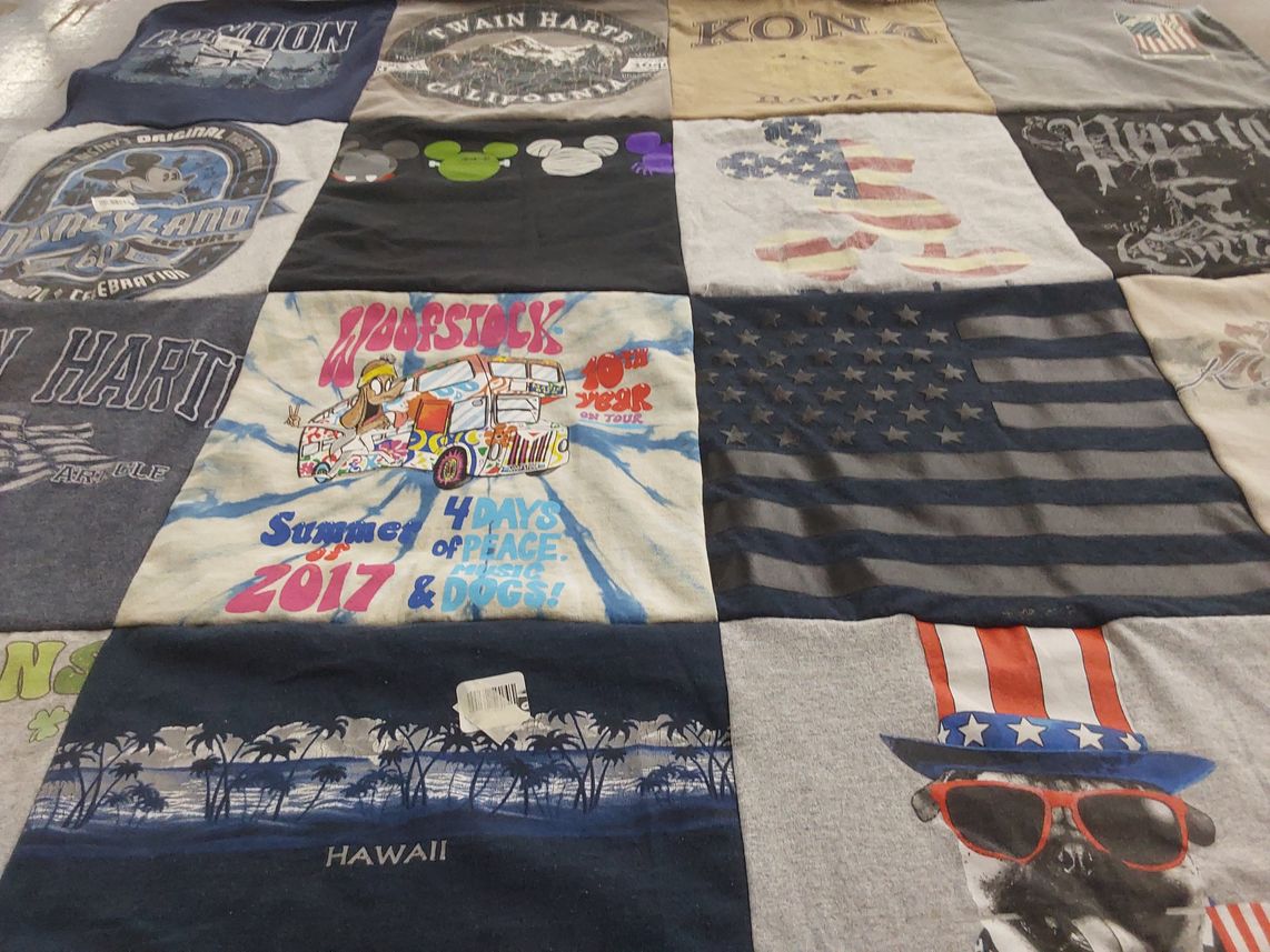 T-shirt quilt with disney, music themes by Joanne from CA