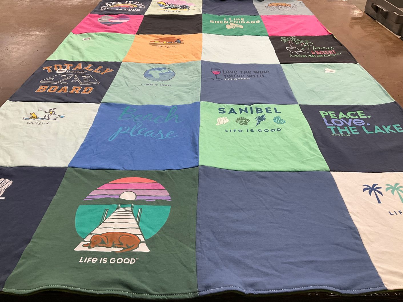 T-shirt quilt with beach, travel themes by Amanda from WI