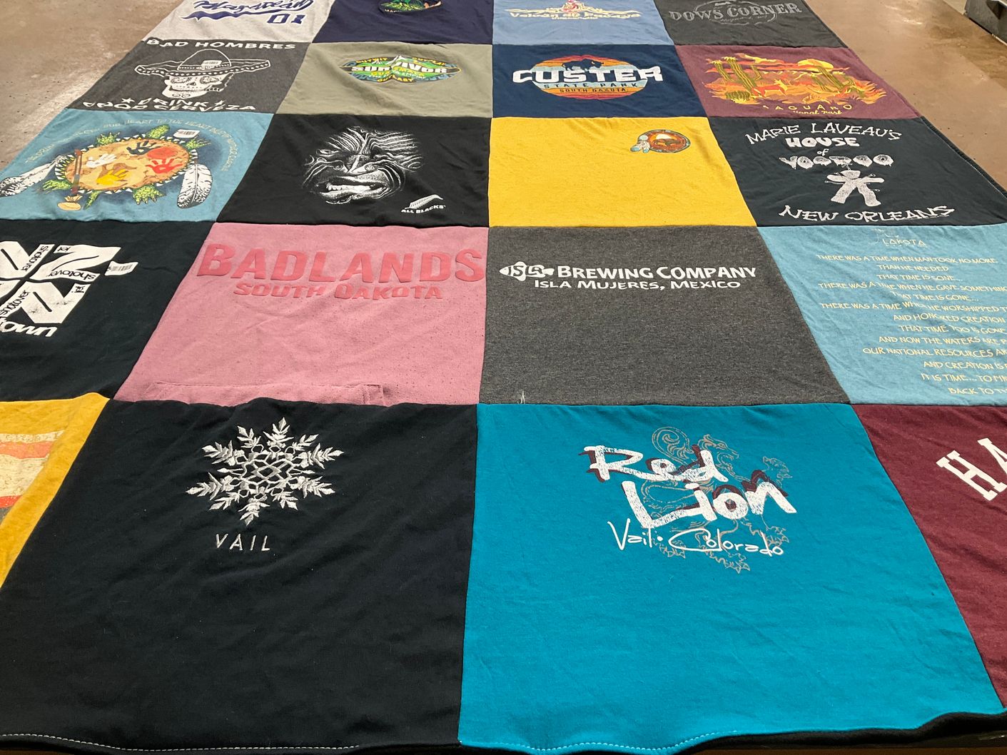 T-shirt quilt with travel, beer themes by Amanda from WI