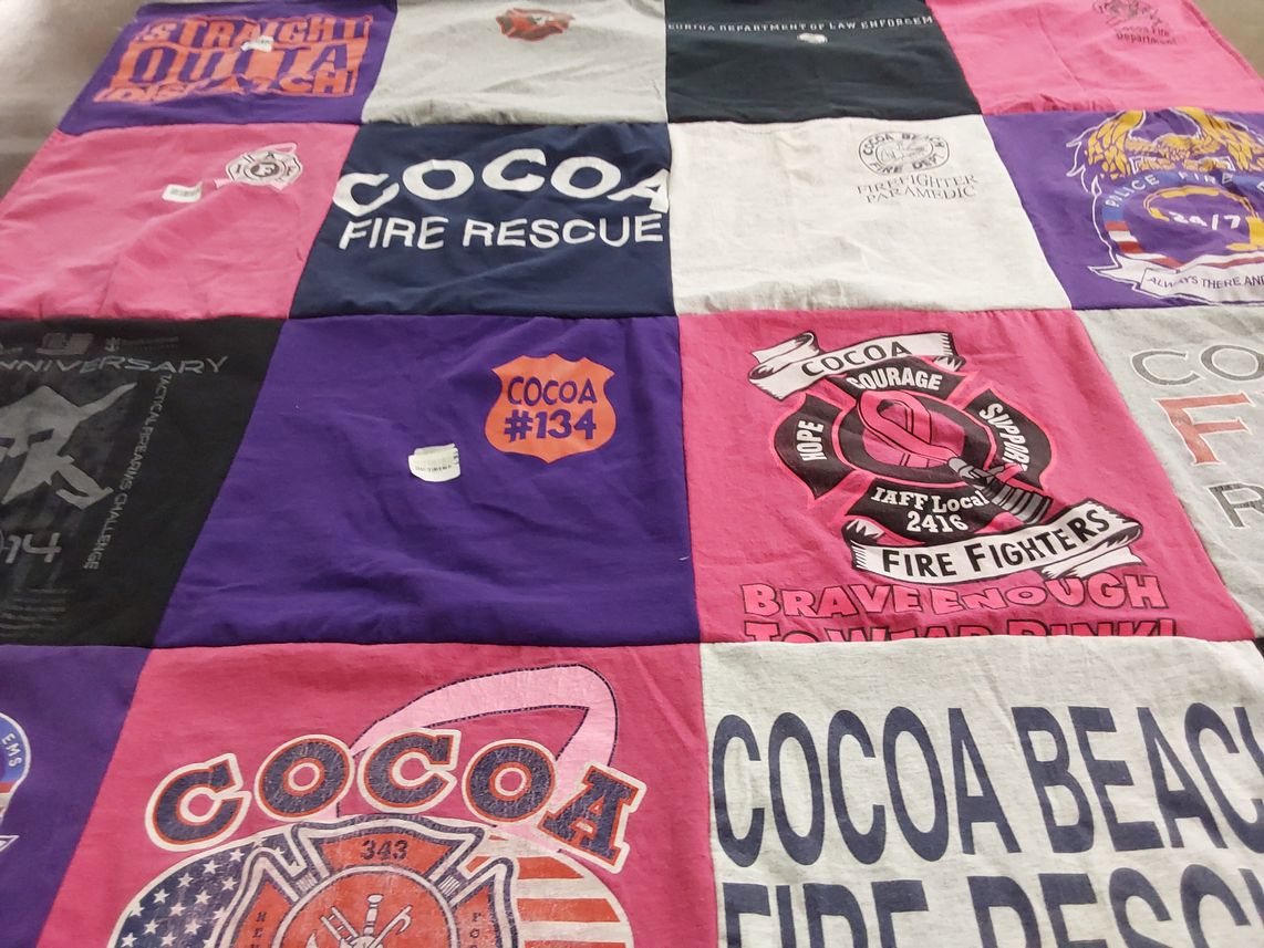 T-shirt quilt with fire fighting, community service themes by michelle from FL