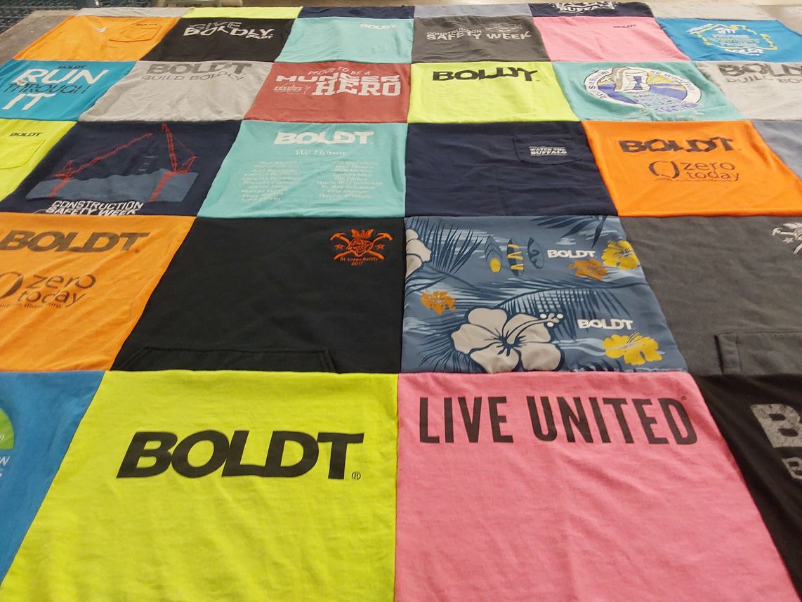 T-shirt quilt with construction, safety themes by Nicole from WI