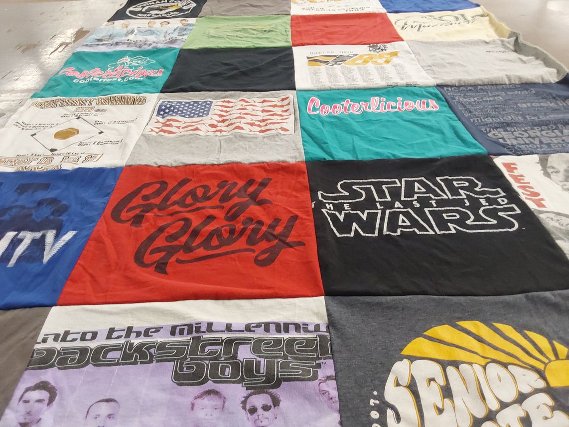 T-shirt quilt with music, movies themes by Emily from GA