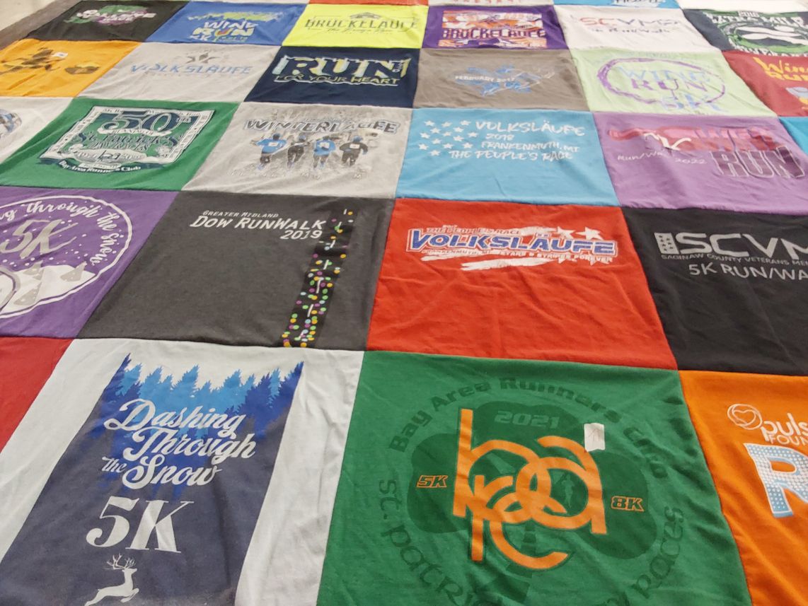 T-shirt quilt with running themes by Heidi from MI