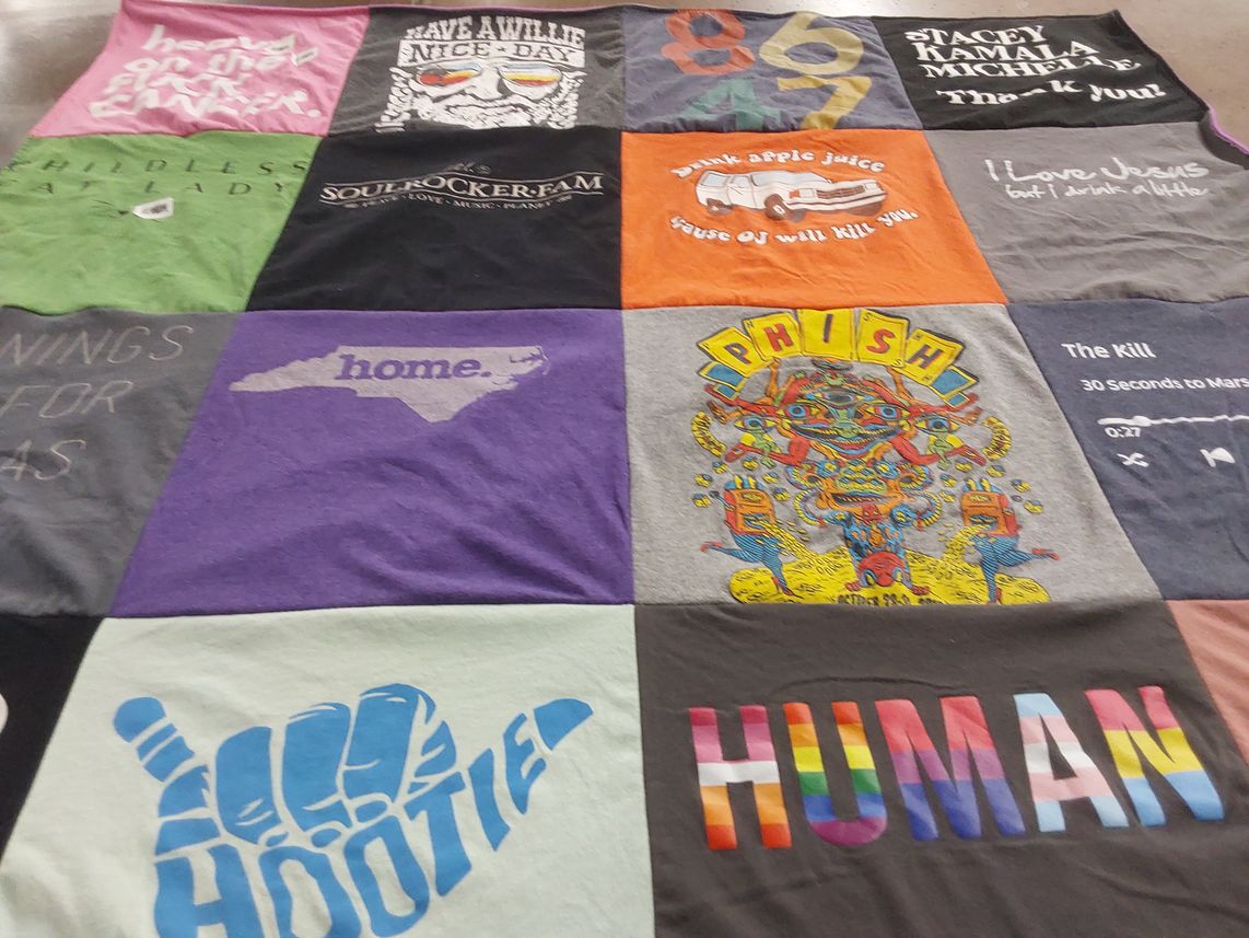 T-shirt quilt with music, health themes by Jenn from NC
