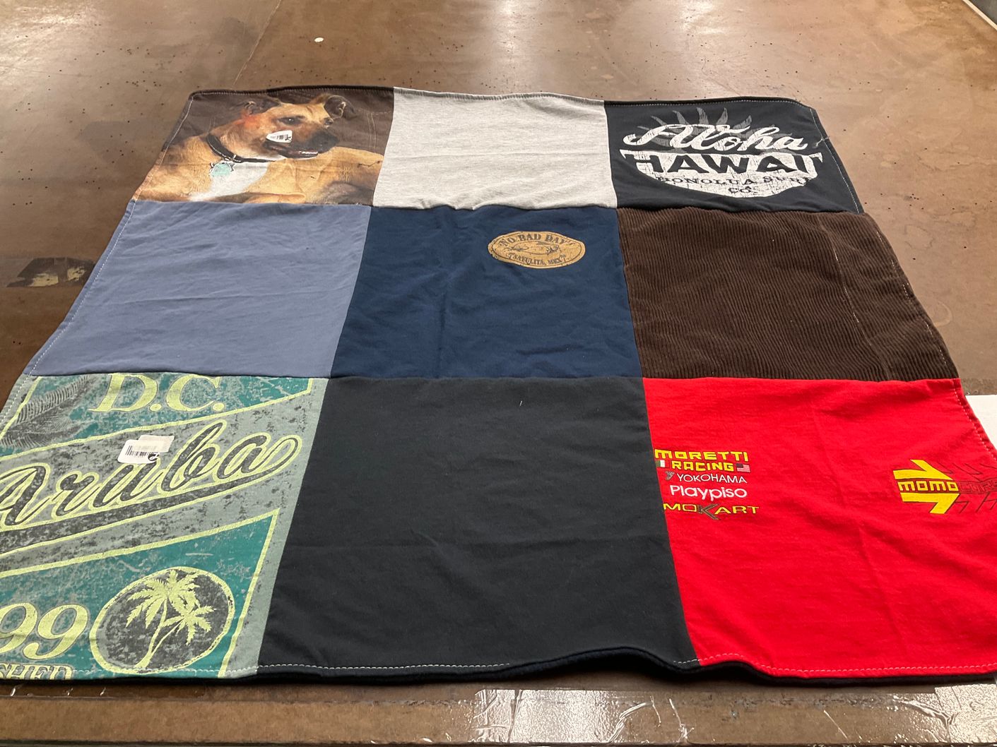 T-shirt quilt with travel, motorsports themes by Caitlin from WA