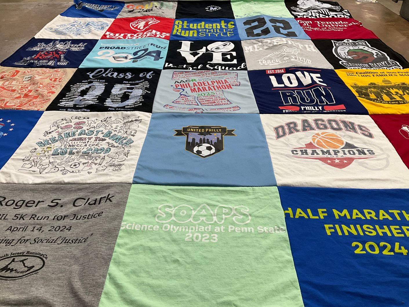 T-shirt quilt featuring dragons, students run philly by Thora from NJ