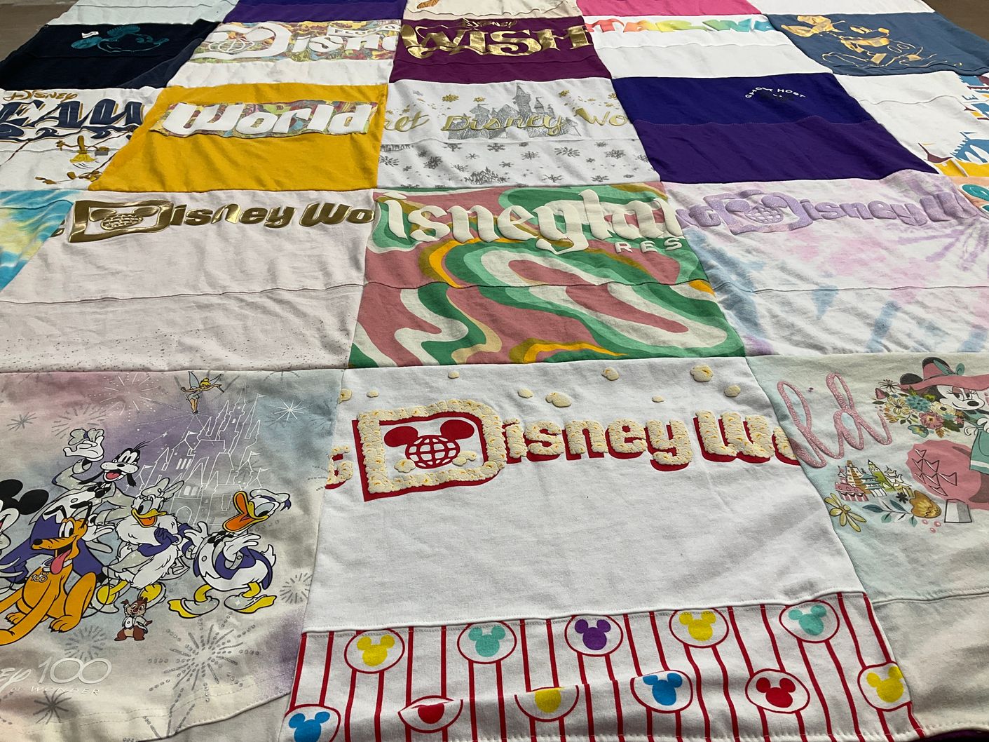 T-shirt quilt with disney parks, animation themes by Amy from TX
