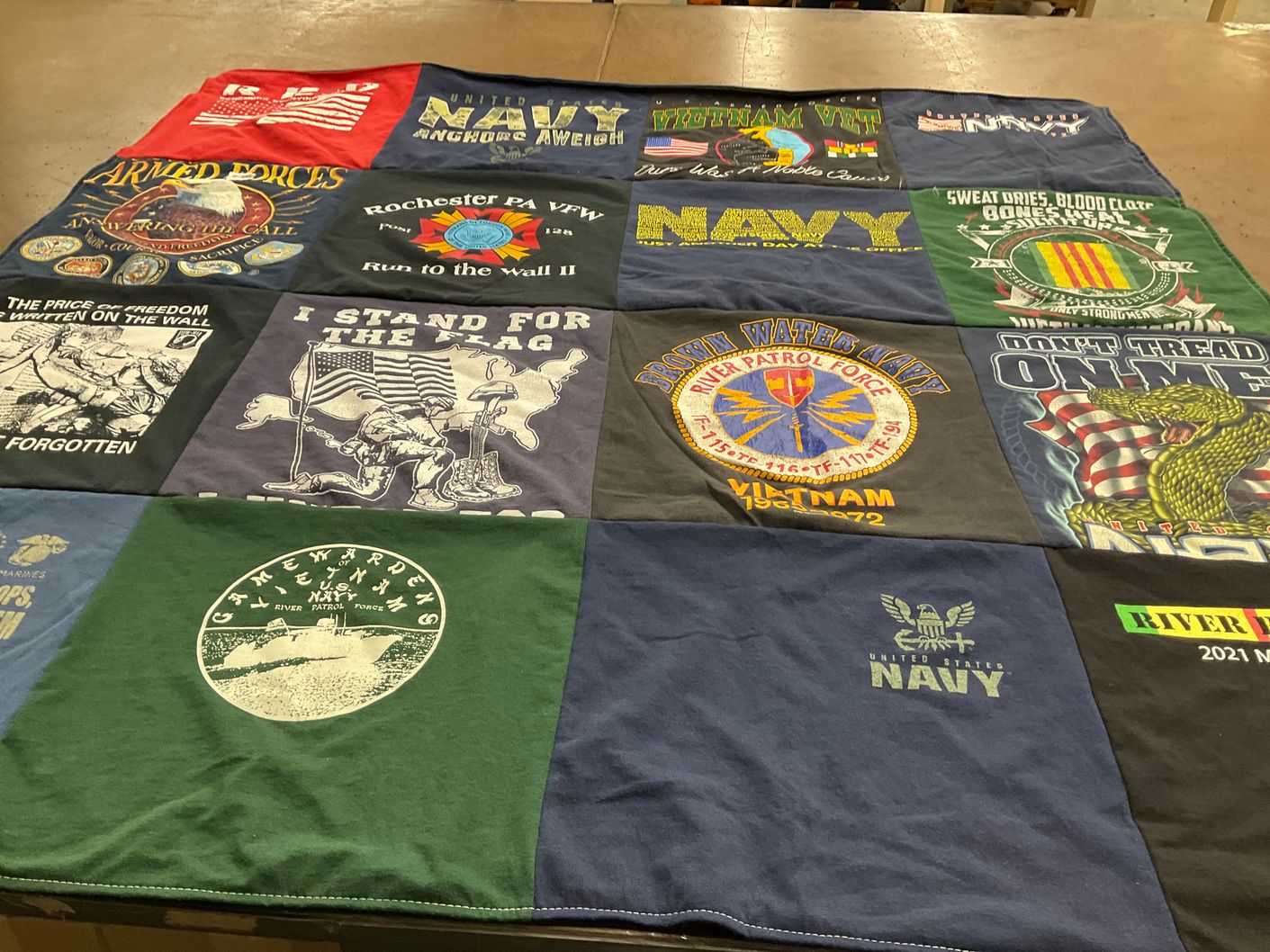 T-shirt quilt with military, veterans themes by Judy from PA