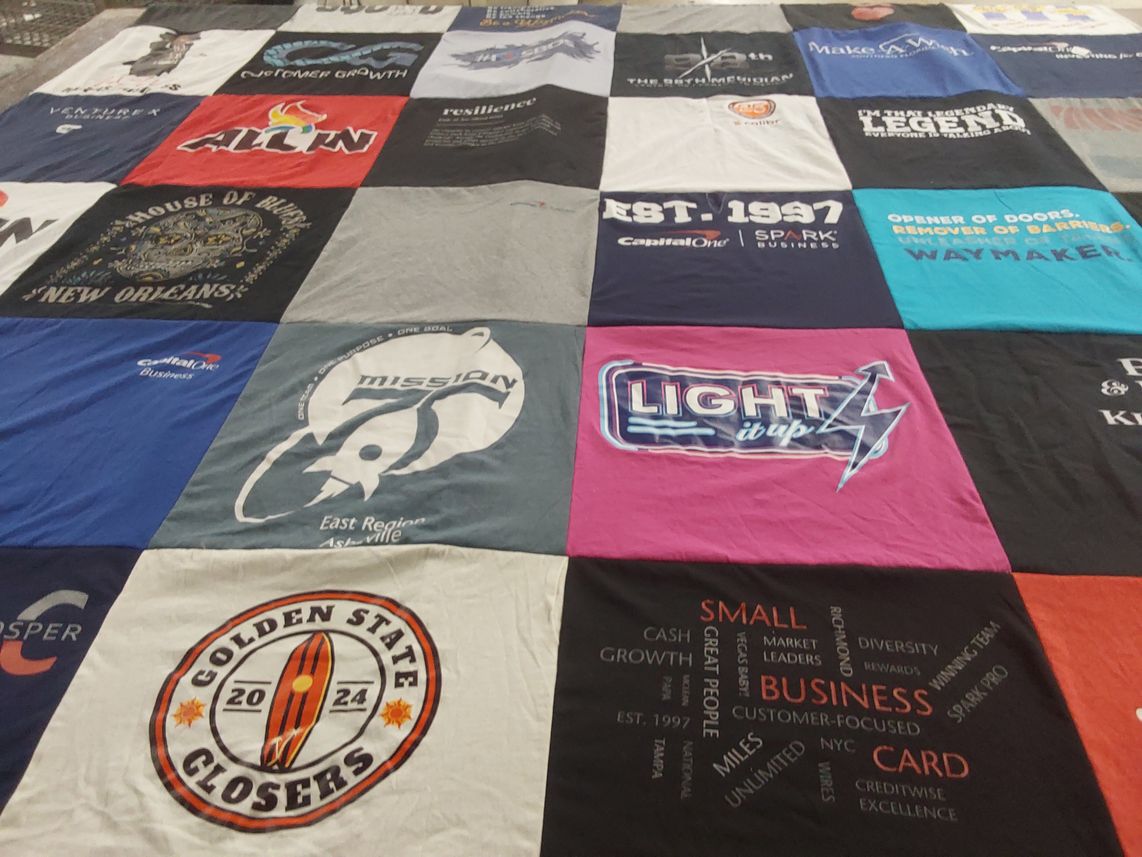 T-shirt quilt with business, customer growth themes by Adrienne from VA